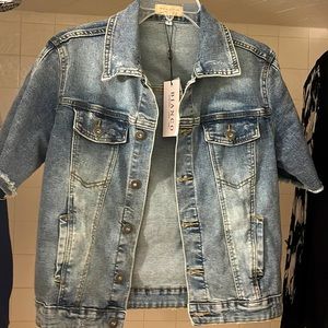 Brand new awesome denim jacket. Perfect color. Yummy soft. Dress up or down.